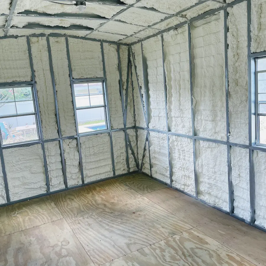 Closed-cell spray foam insulation applied to wall cavities in a residential project in Roanoke