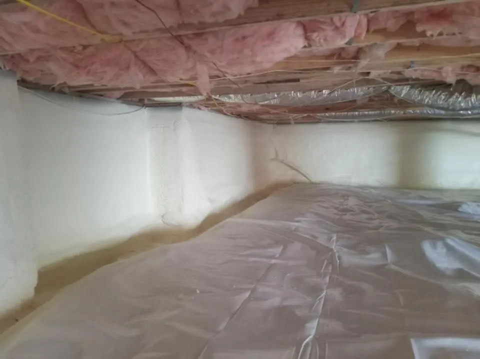 Crawl space encapsulation with closed-cell spray foam for Commercial Roof Restoration in Roanoke